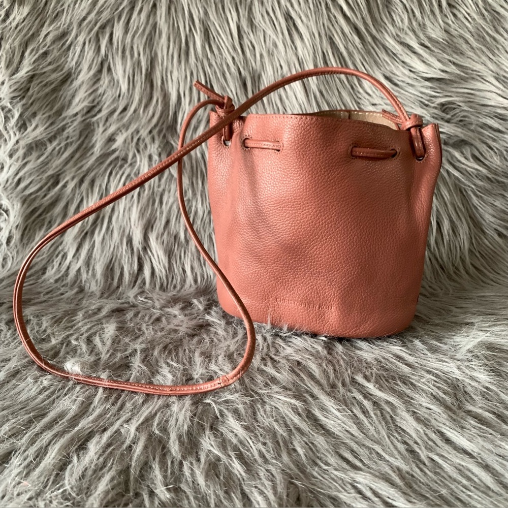 Pink leather bucket crossbody